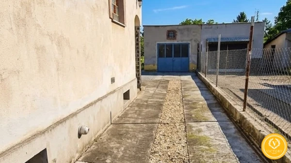 Priestranný poschodový rodinný dom vo Fiľakove